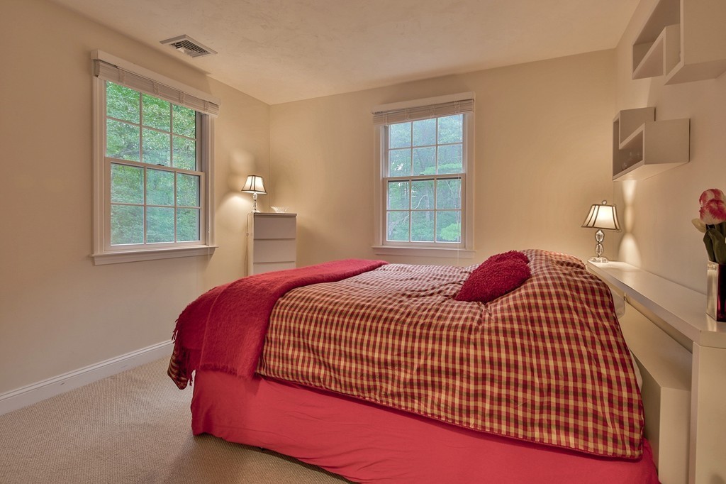 126 Taylor Road Stow, MA 01775 - Photo 13 of 16 a bedroom with a bed and window
