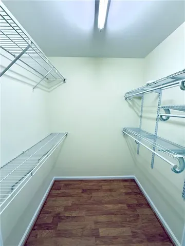 a view of a room with racks on the wall