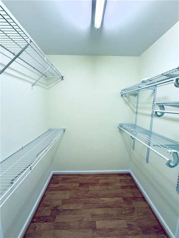 1035 Prestwyck Court Alpharetta, GA 30004 - Photo 16 of 21 a view of a room with racks on the wall