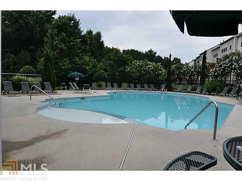 1035 Prestwyck Court Alpharetta, GA 30004 - Photo 5 of 21 a view of outdoor space and swimming pool