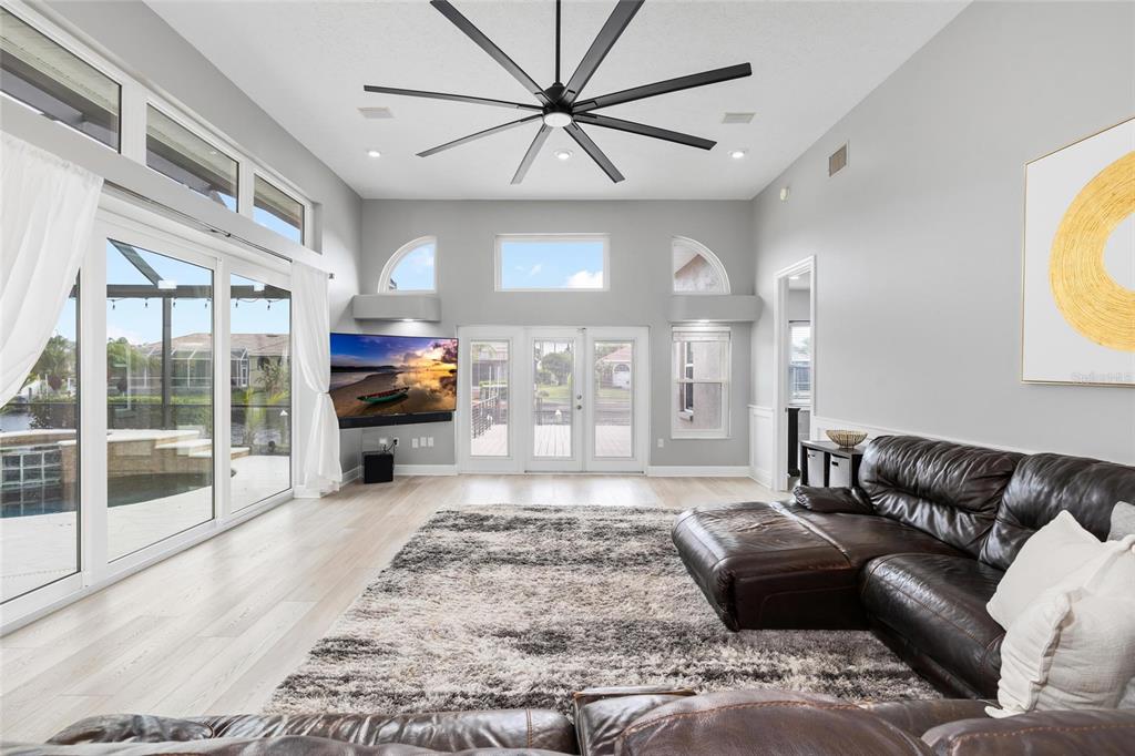 9810 Compass Point Way Tampa, FL 33615 - Photo 20 of 81 a living room with furniture and a large window