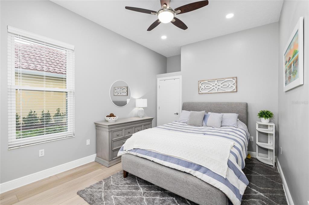 9810 Compass Point Way Tampa, FL 33615 - Photo 32 of 81 a bedroom with a bed and a window