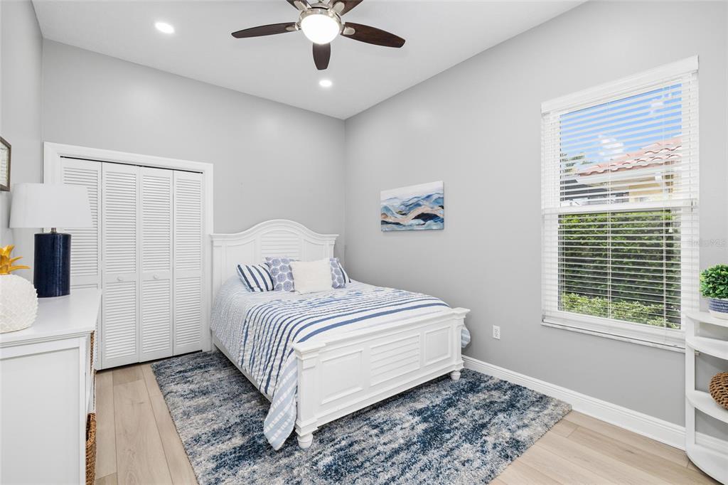 9810 Compass Point Way Tampa, FL 33615 - Photo 36 of 81 a bedroom with a bed and a window
