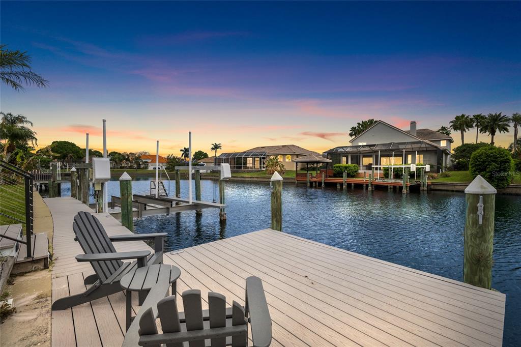 9810 Compass Point Way Tampa, FL 33615 - Photo 54 of 81 a view of a lake with sitting area
