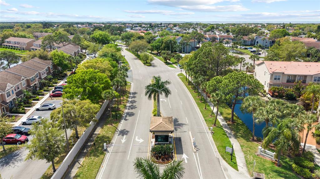 9810 Compass Point Way Tampa, FL 33615 - Photo 71 of 81 an aerial view of a house with a yard