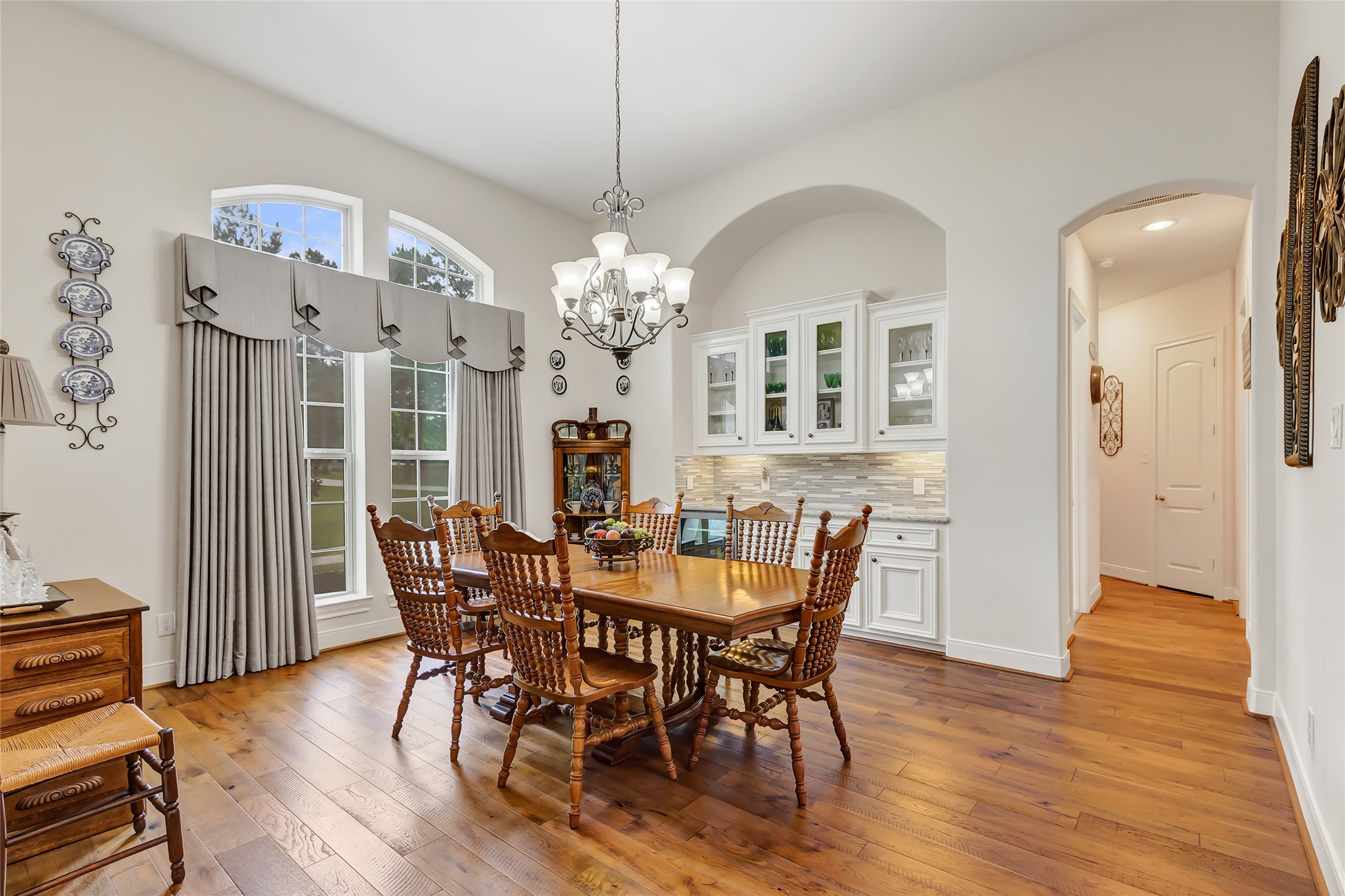 229 Sundog Road Huntsville, TX 77340 - Photo 14 of 50 Here is a view of the spacious Dining room with built in buffet and cabinets! These windows also offer natural light!