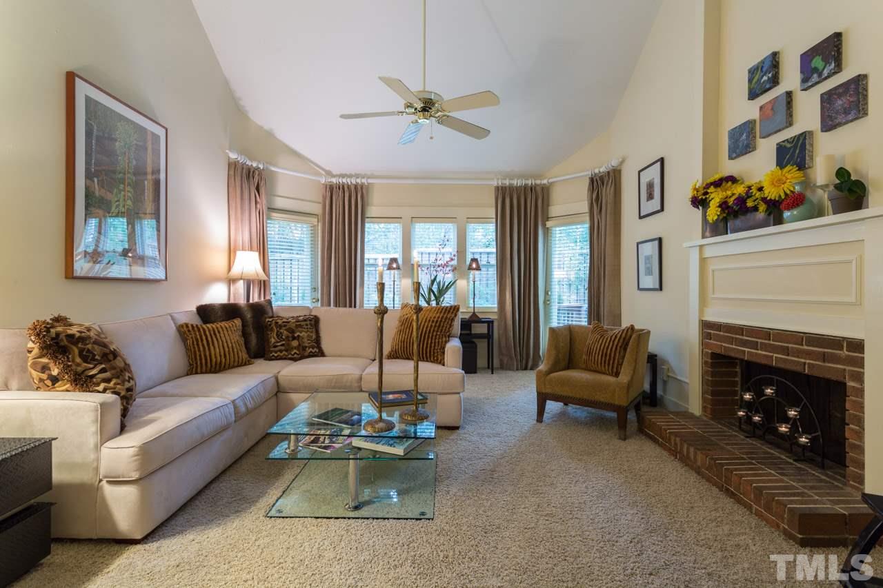 Vaulted Ceiling, gas logs, built in bookshelves
