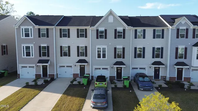 a view of a big house with a patio