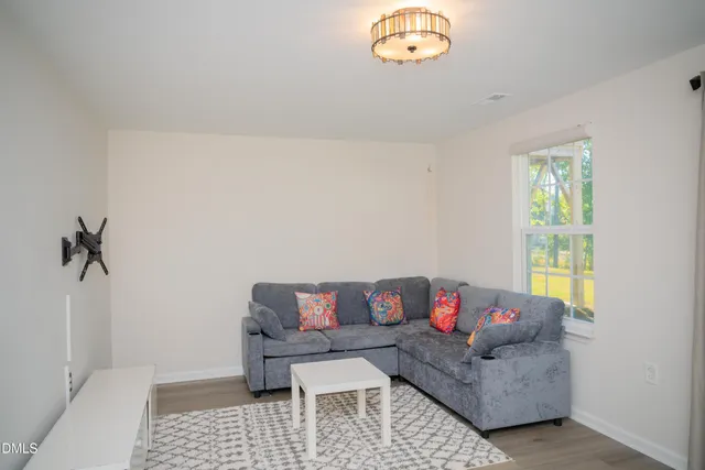 a view of a room that has a window