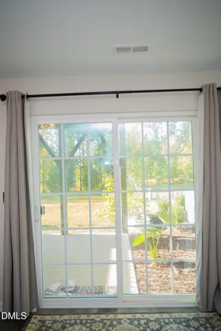 a front view of a house with glass windows