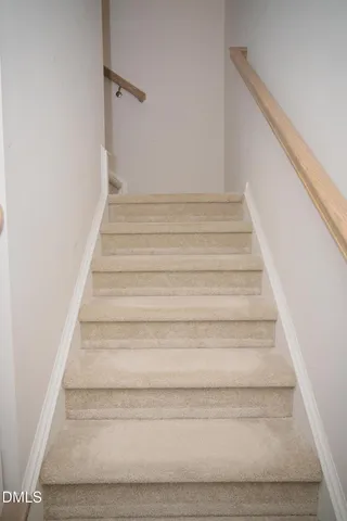 a toilet sitting in a bathroom next to a sink