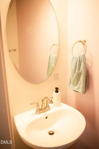 a kitchen with stainless steel appliances kitchen island granite countertop a sink refrigerator and cabinets