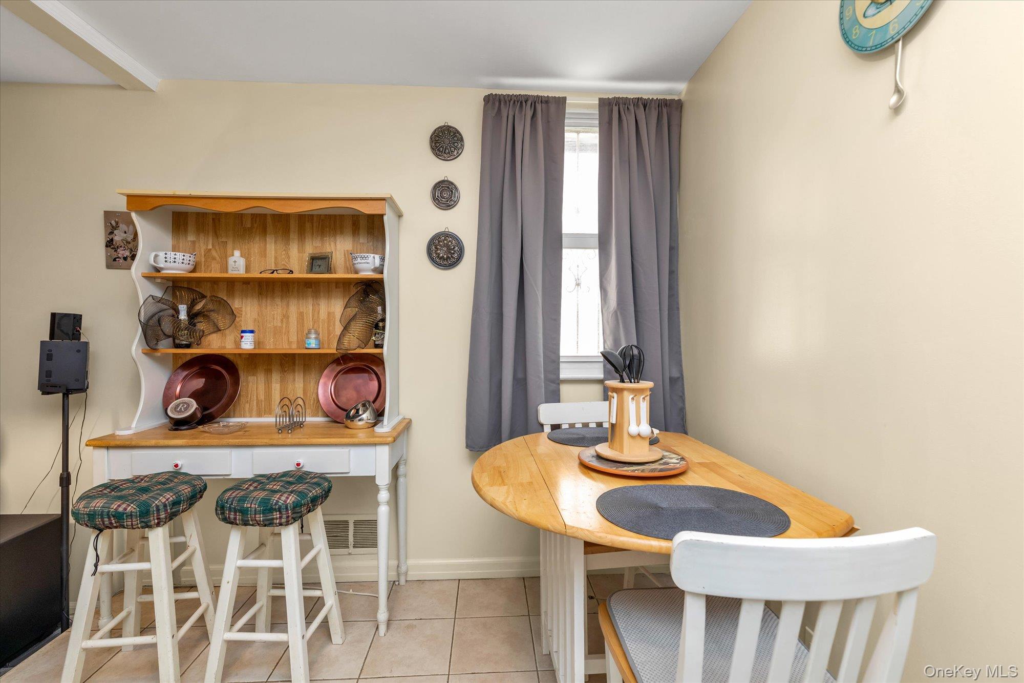 2301 Camp Road Queens, NY 11691 - Photo 18 of 23 a dining room with furniture and window