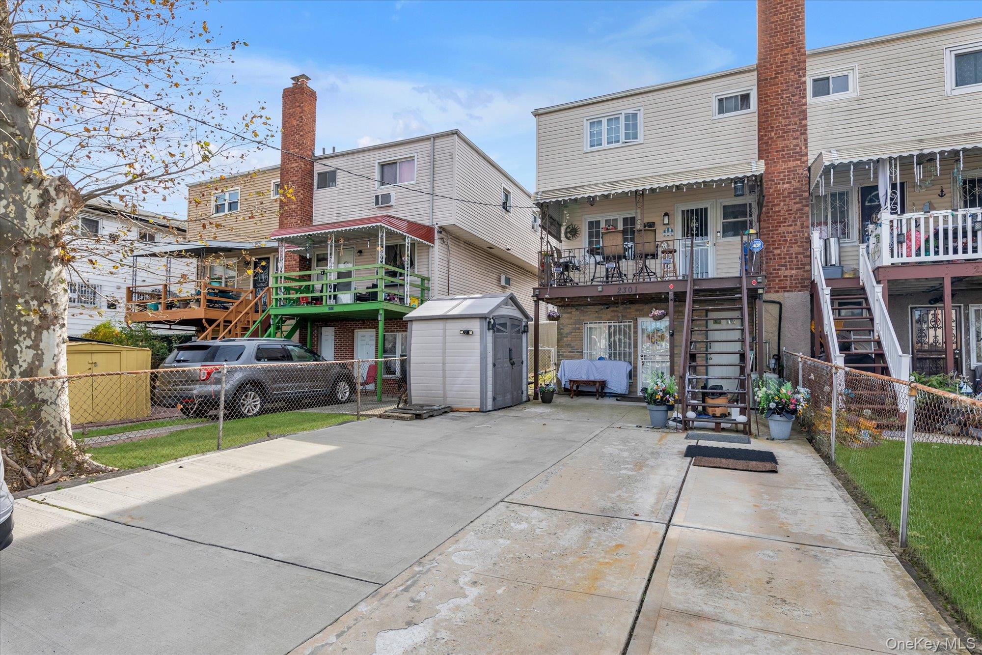 2301 Camp Road Queens, NY 11691 - Photo 21 of 23 a group of cars parked in front of a building