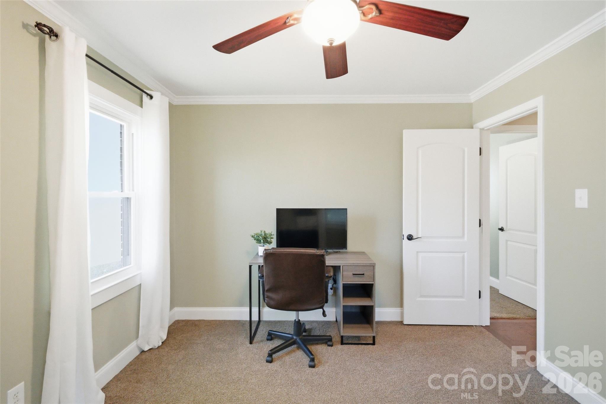 2291 Hicklin Bridge Road Edgemoor, SC 29712 - Photo 11 of 42 a view of a workspace with furniture and a window