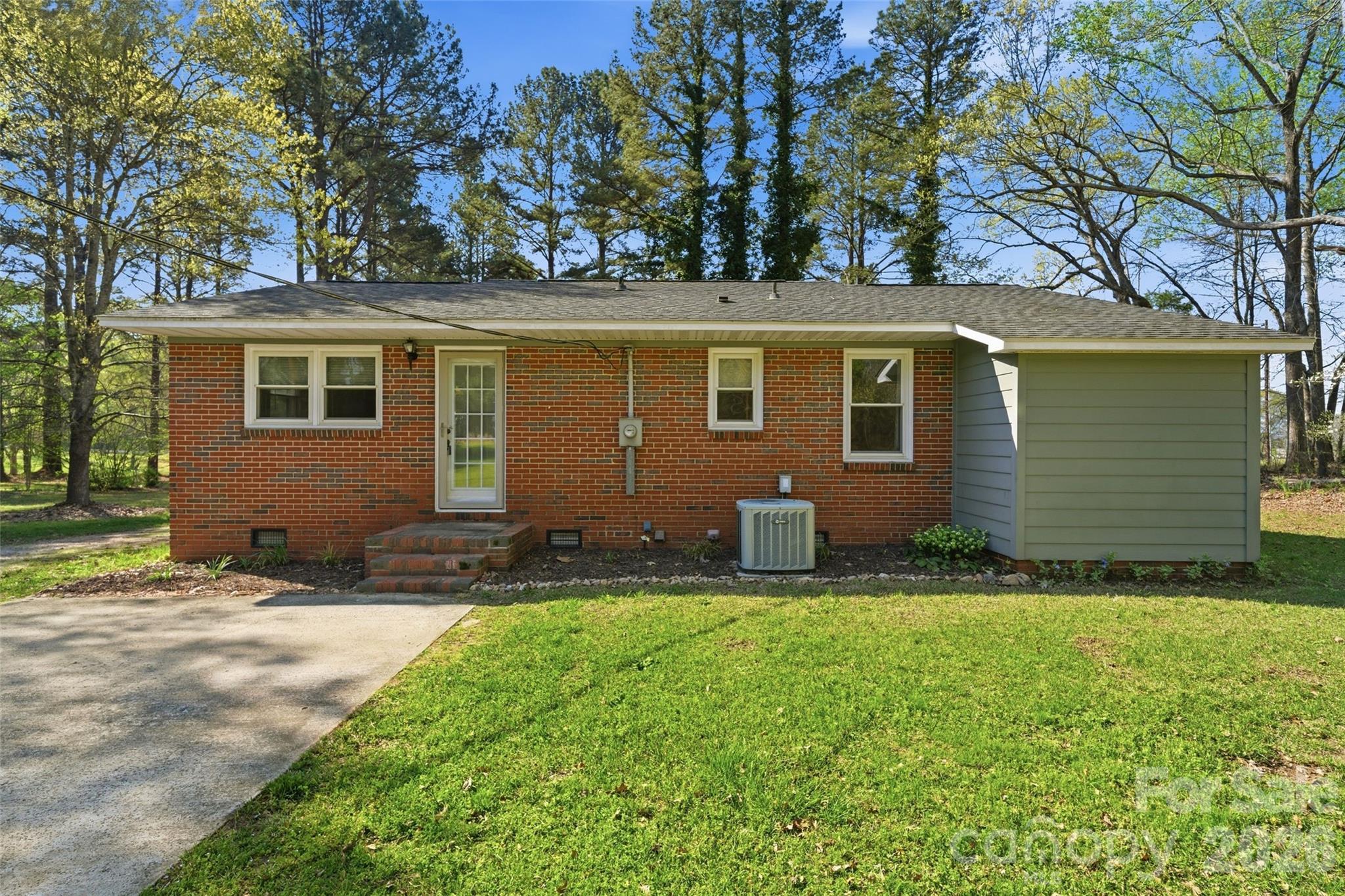 2291 Hicklin Bridge Road Edgemoor, SC 29712 - Photo 23 of 42 front view of a house with a yard