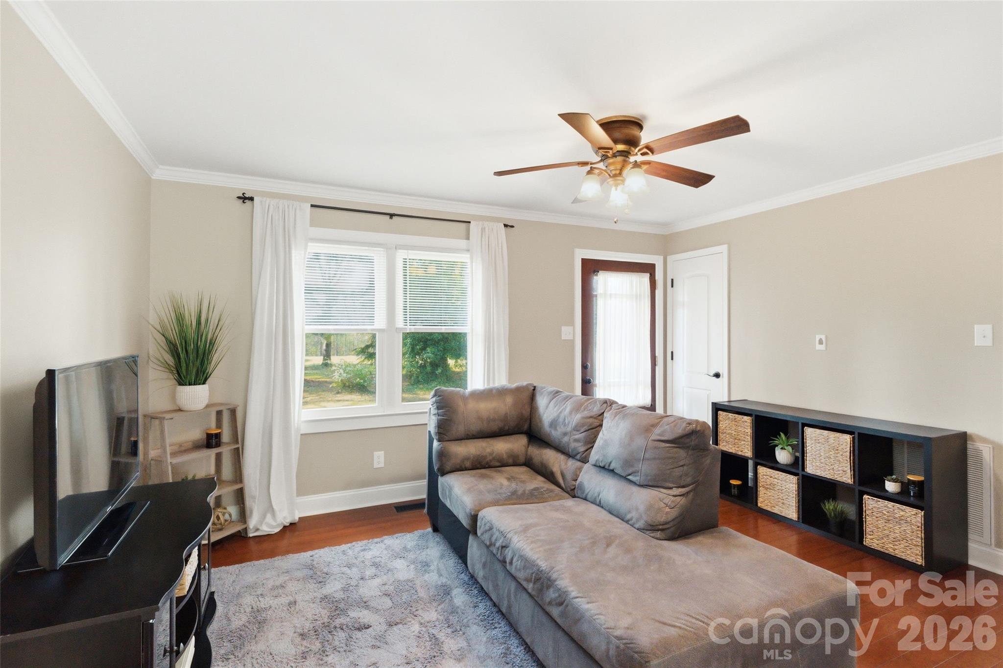 2291 Hicklin Bridge Road Edgemoor, SC 29712 - Photo 3 of 42 a living room with furniture and a flat screen tv
