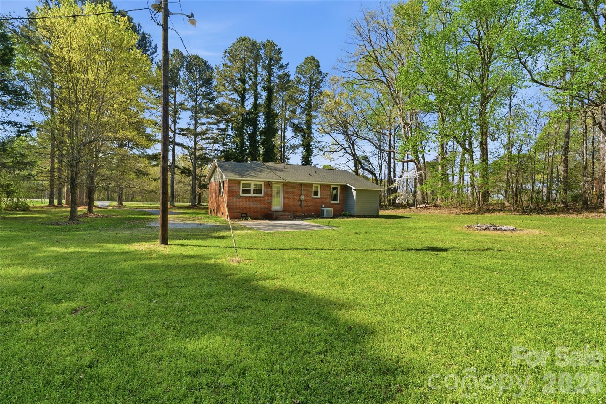 2291 Hicklin Bridge Road Edgemoor, SC 29712 - Photo 31 of 42 a front view of a house with a yard