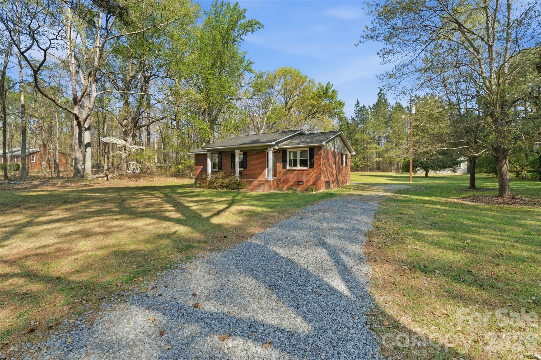 2291 Hicklin Bridge Road Edgemoor, SC 29712 - Photo 33 of 42 a view of a house with a big yard