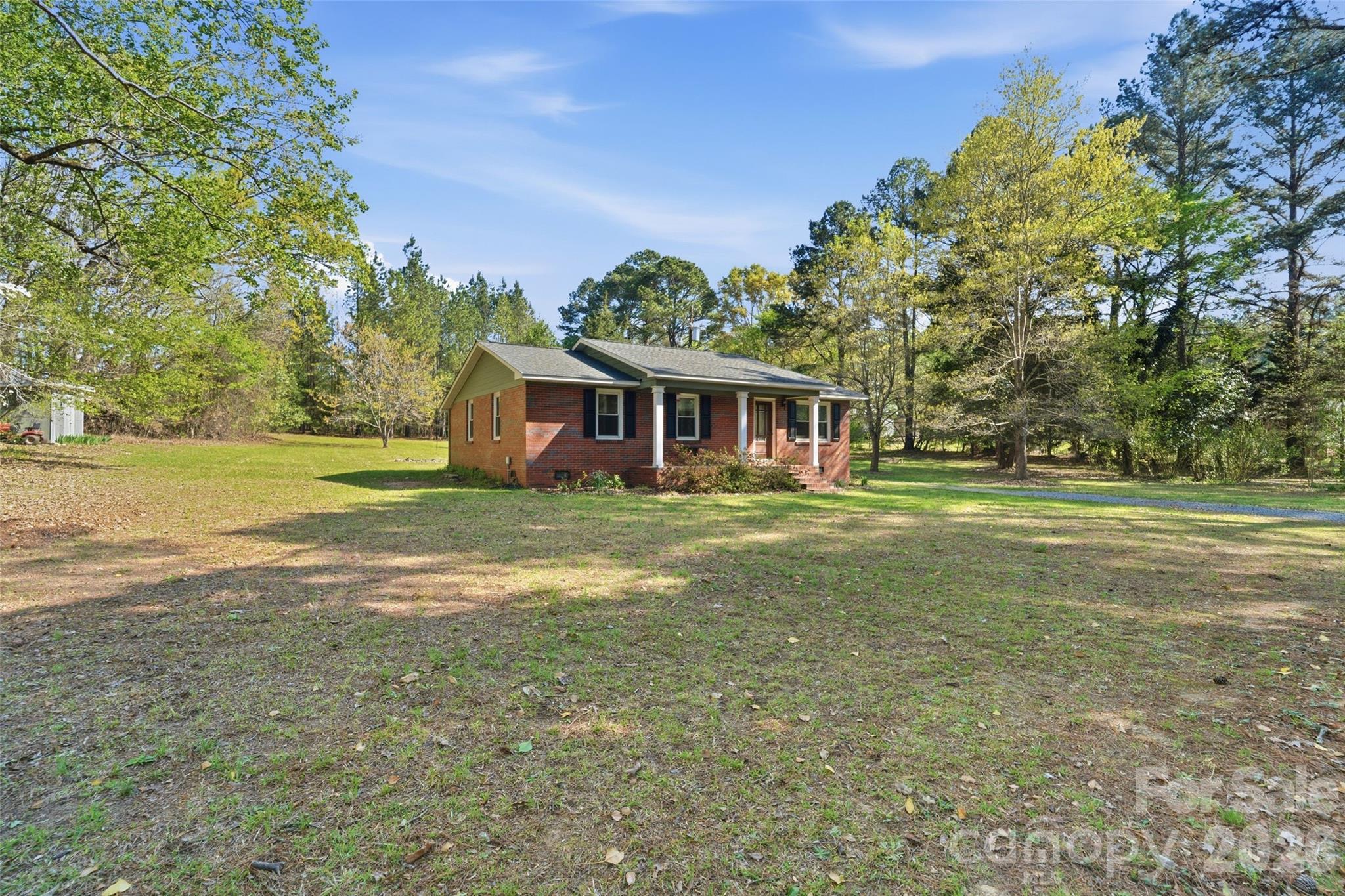 2291 Hicklin Bridge Road Edgemoor, SC 29712 - Photo 34 of 42 a view of a house with a yard