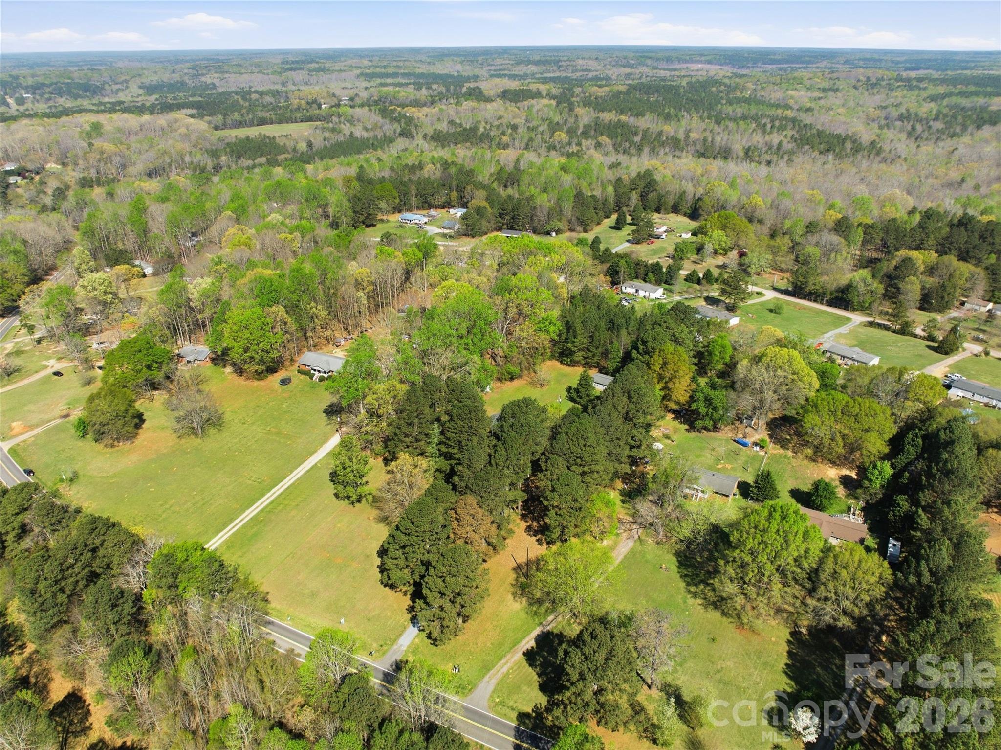 2291 Hicklin Bridge Road Edgemoor, SC 29712 - Photo 41 of 42 a view of a lake with green field