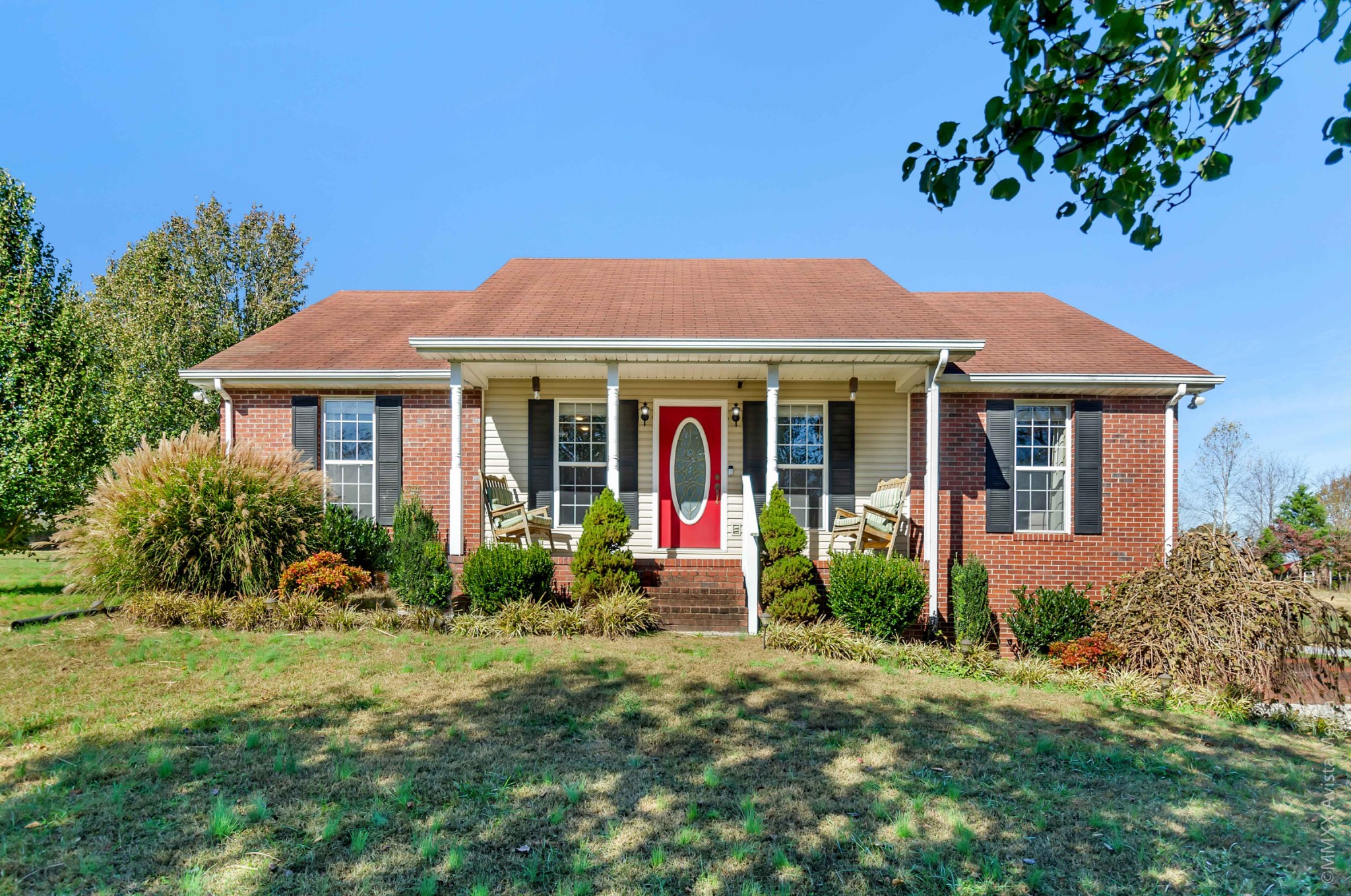 267 Ernest Cates Road Bethpage, TN 37022 - Photo 1 of 30 a front view of a house with garden