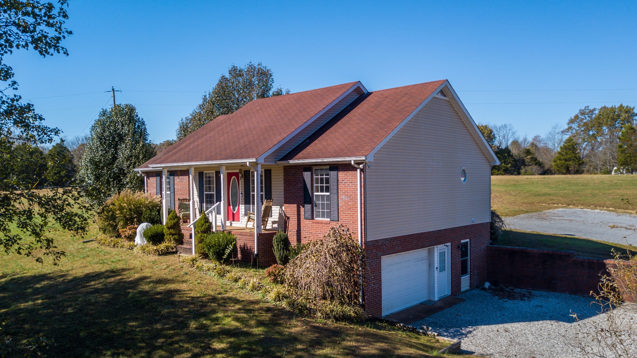 267 Ernest Cates Road Bethpage, TN 37022 - Photo 3 of 30 a front view of a house with garden