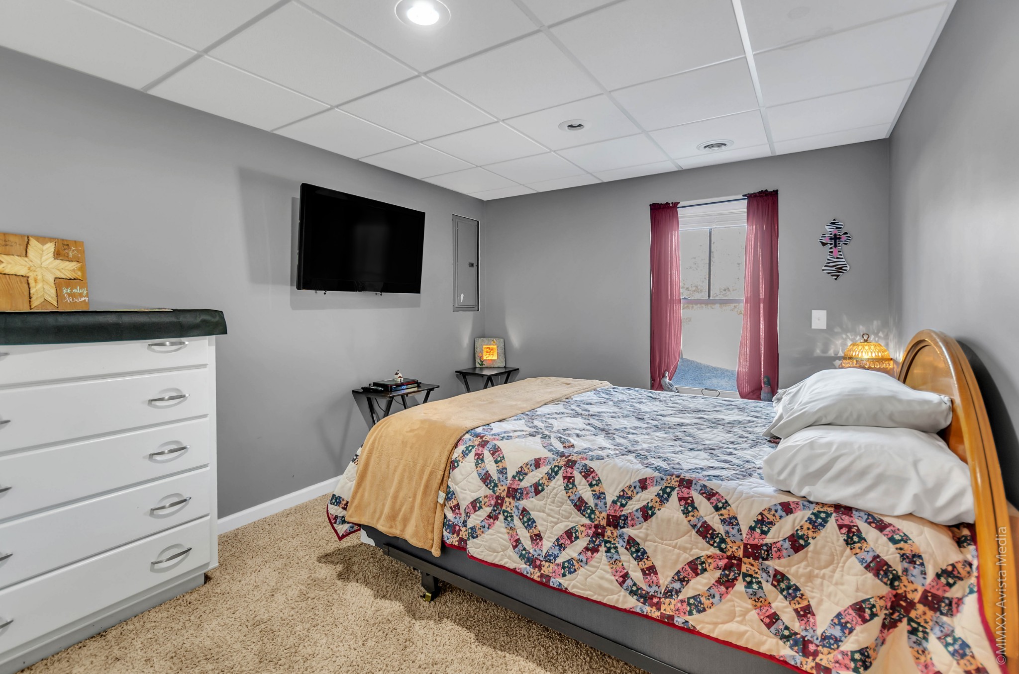 267 Ernest Cates Road Bethpage, TN 37022 - Photo 21 of 30 a bedroom with a bed and a flat screen tv
