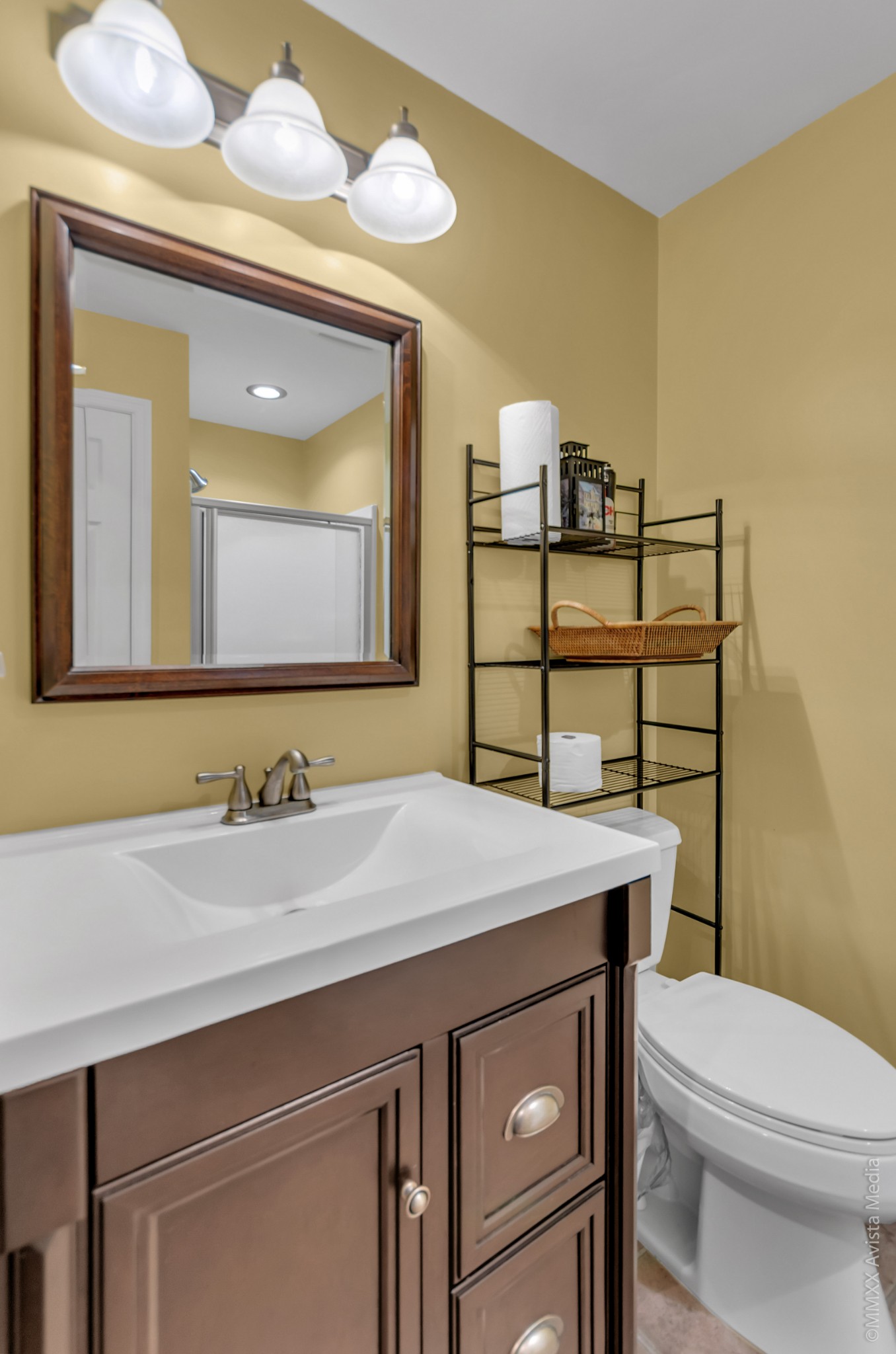 267 Ernest Cates Road Bethpage, TN 37022 - Photo 22 of 30 a bathroom with a sink a toilet and mirror