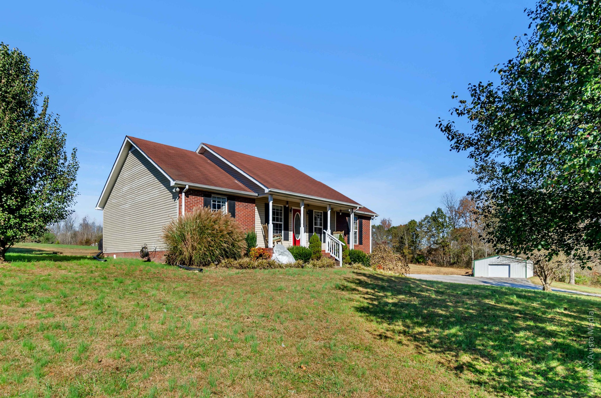267 Ernest Cates Road Bethpage, TN 37022 - Photo 4 of 30 a front view of house with yard and green space