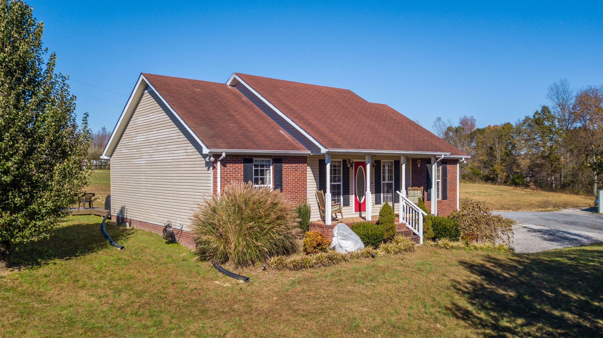 267 Ernest Cates Road Bethpage, TN 37022 - Photo 5 of 30 a front view of a house with garden