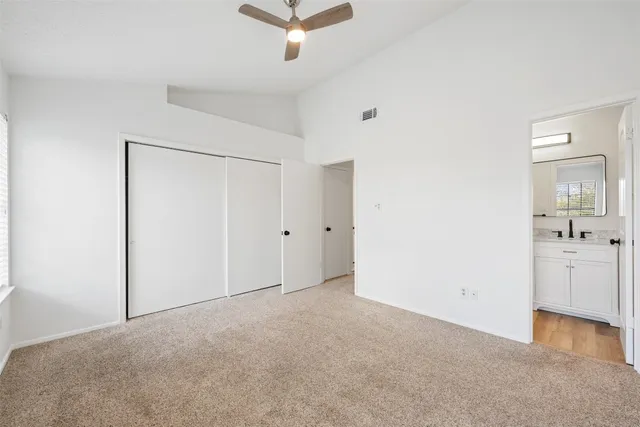 an empty room with a bathroom