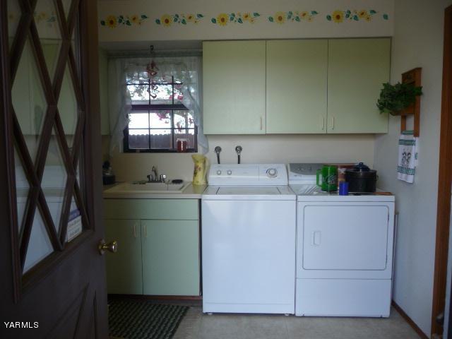 421 Blaine Road Granger, WA 98932 - Photo 16 of 23 a room with storage and utility