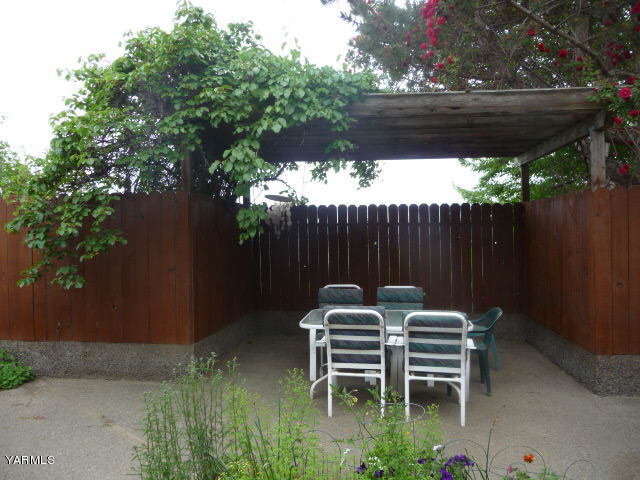 421 Blaine Road Granger, WA 98932 - Photo 18 of 23 a view of a chairs and table in the patio
