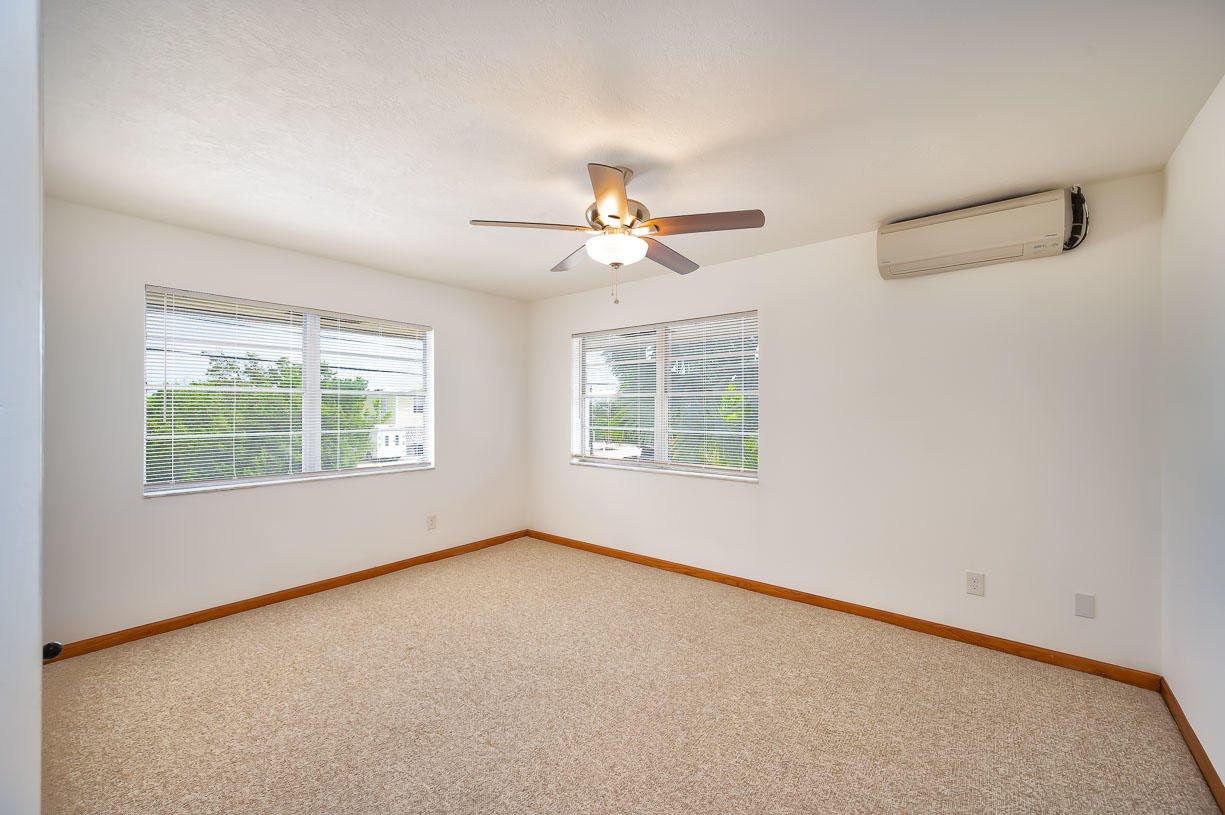 27346 Martinique Lane Summerland Key, FL 33042 - Photo 8 of 33 an empty room with a window and a ceiling fan