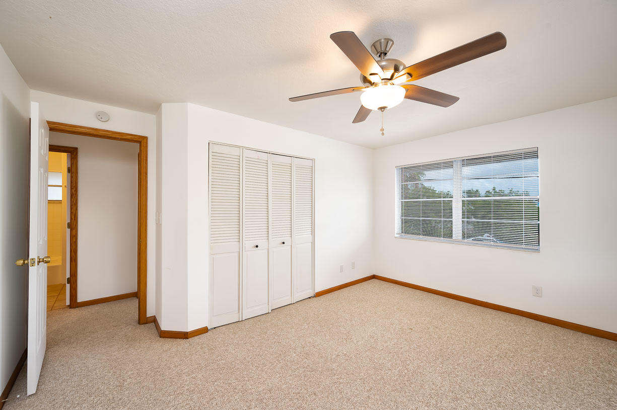 27346 Martinique Lane Summerland Key, FL 33042 - Photo 9 of 33 a view of an empty room with a ceiling fan and window