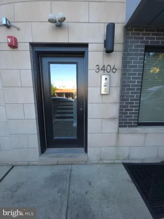 a view of building with yard and mountain view