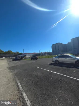 a view of a road with an ocean view