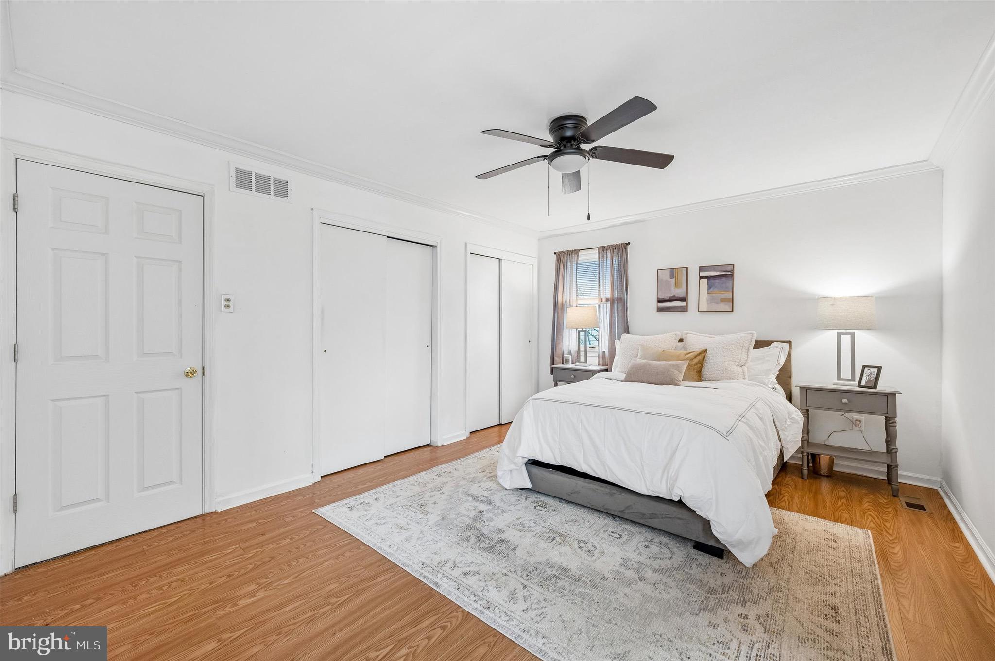 22 East Belair Road Ridley Park, PA 19078 - Photo 20 of 36 a spacious bedroom with a bed and a dresser