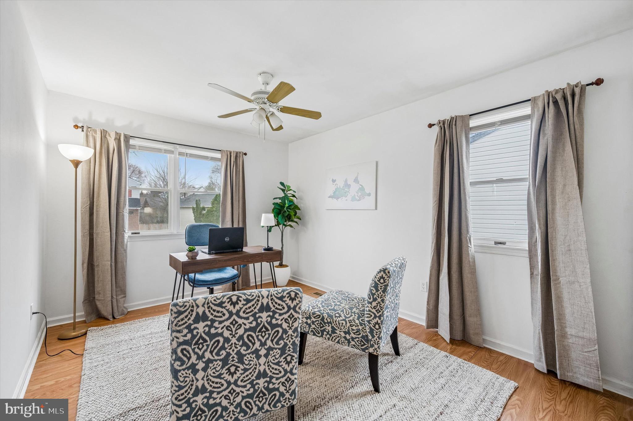 22 East Belair Road Ridley Park, PA 19078 - Photo 24 of 36 a workspace room with furniture and wooden floor