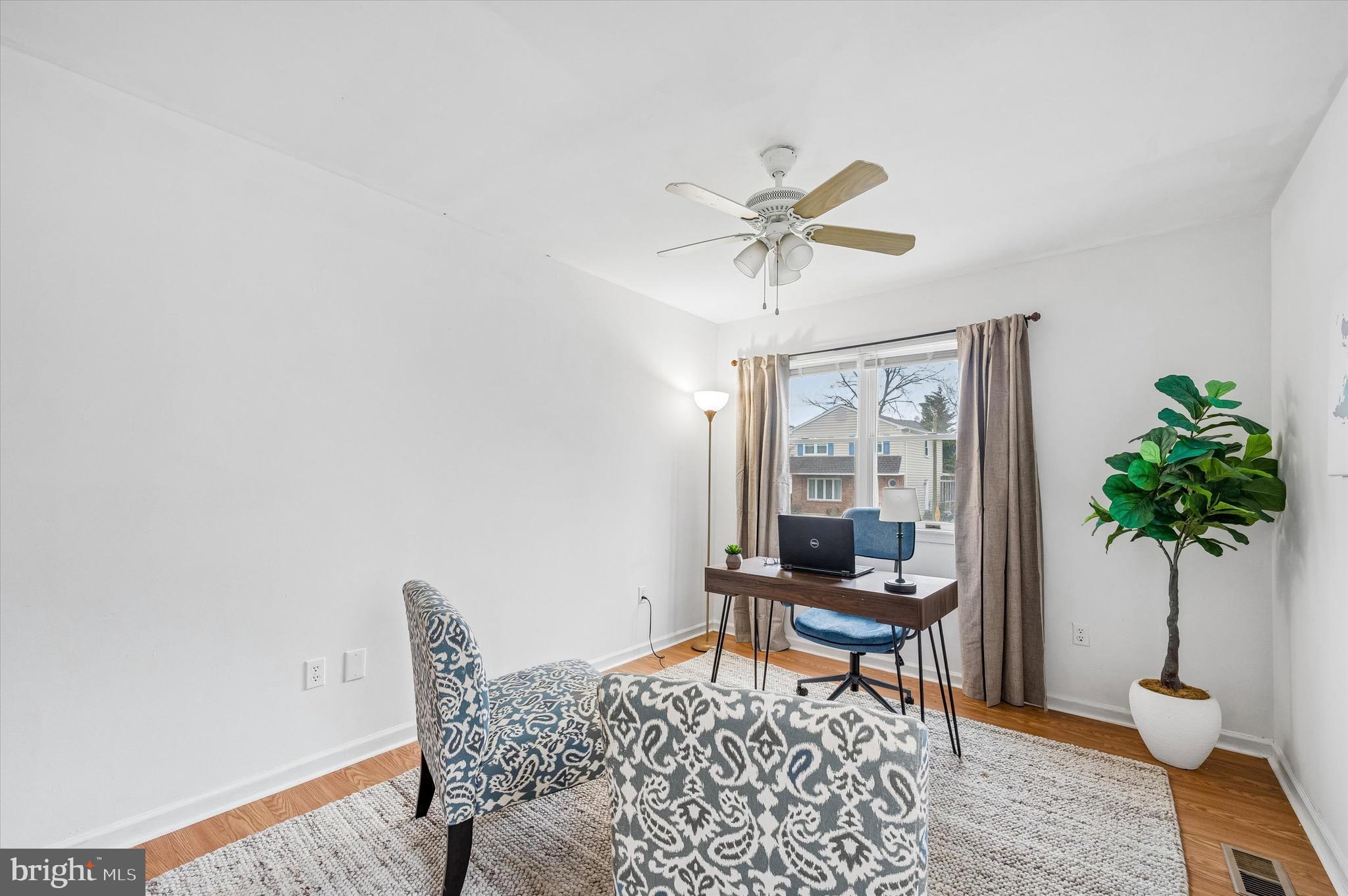 22 East Belair Road Ridley Park, PA 19078 - Photo 25 of 36 a living room with furniture and a potted plant