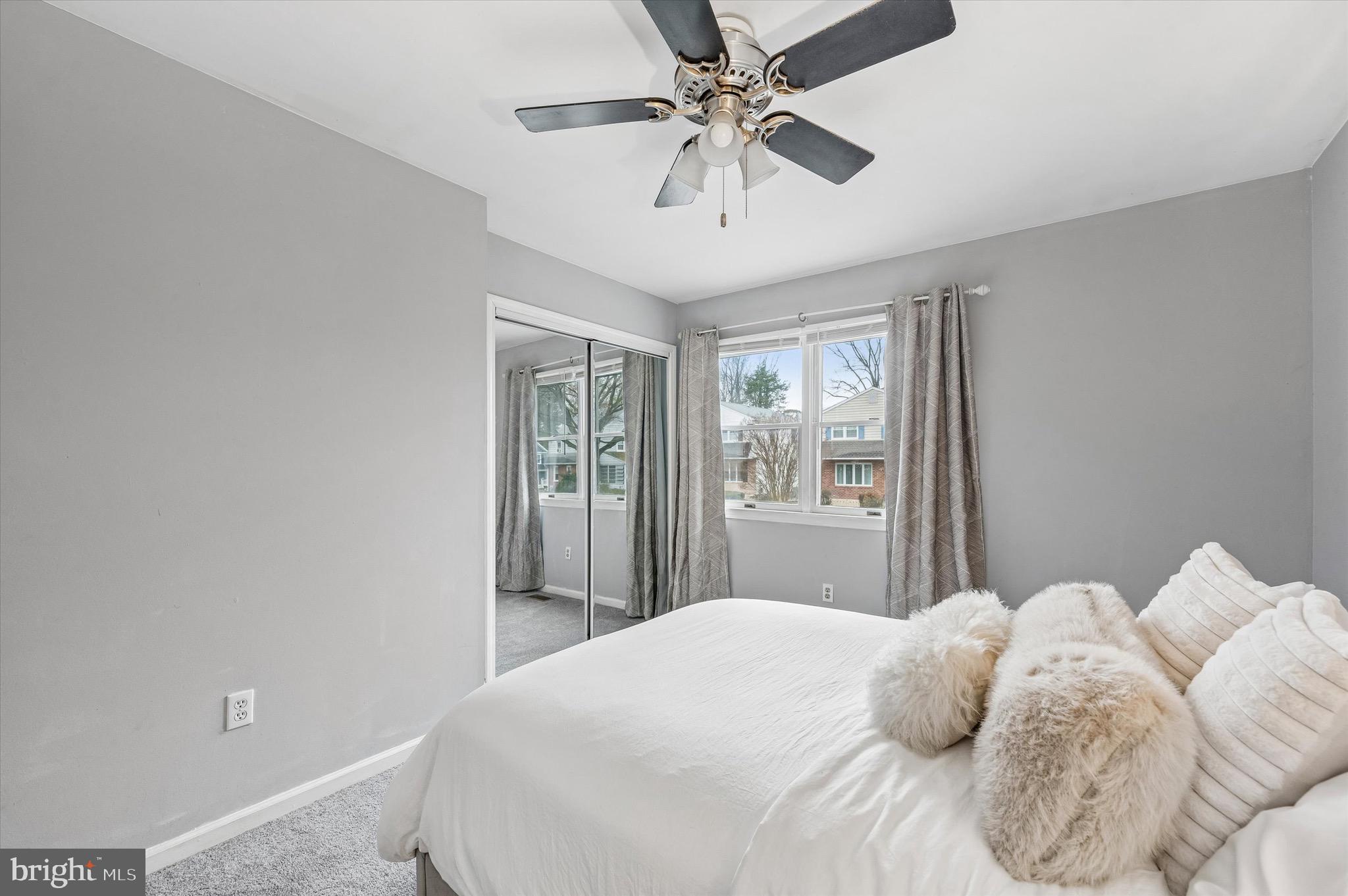 22 East Belair Road Ridley Park, PA 19078 - Photo 28 of 36 a bedroom with a large bed and a window