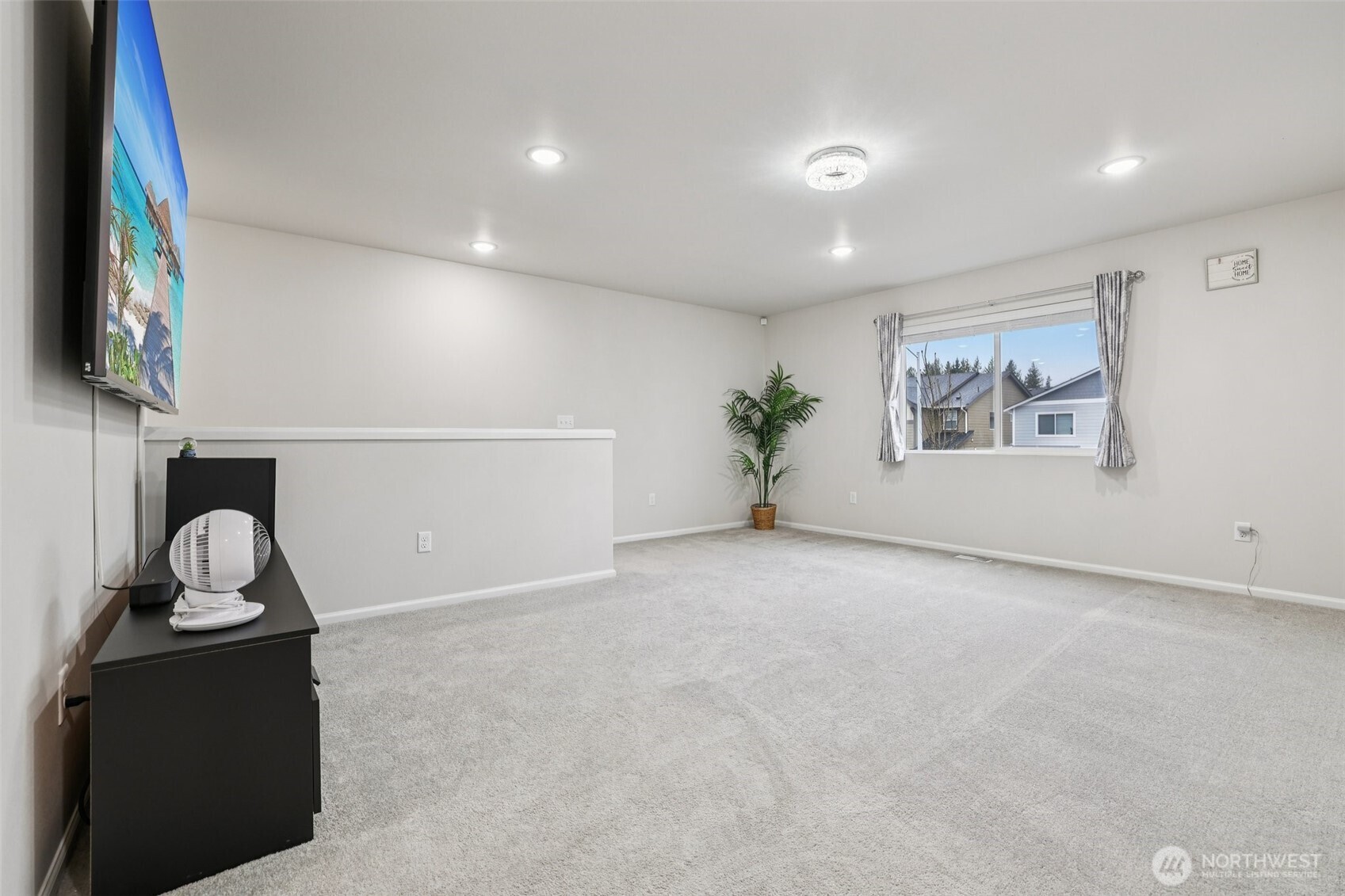 1132 15th Avenue Sultan, WA 98294 - Photo 14 of 25 a view of a living room and workspace