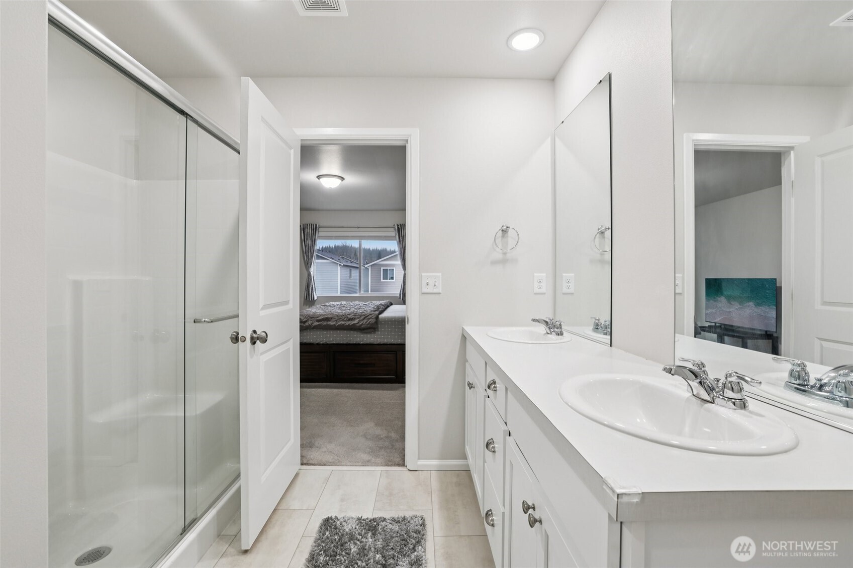 1132 15th Avenue Sultan, WA 98294 - Photo 18 of 26 a en suite bathroom with a sink shower and a mirror