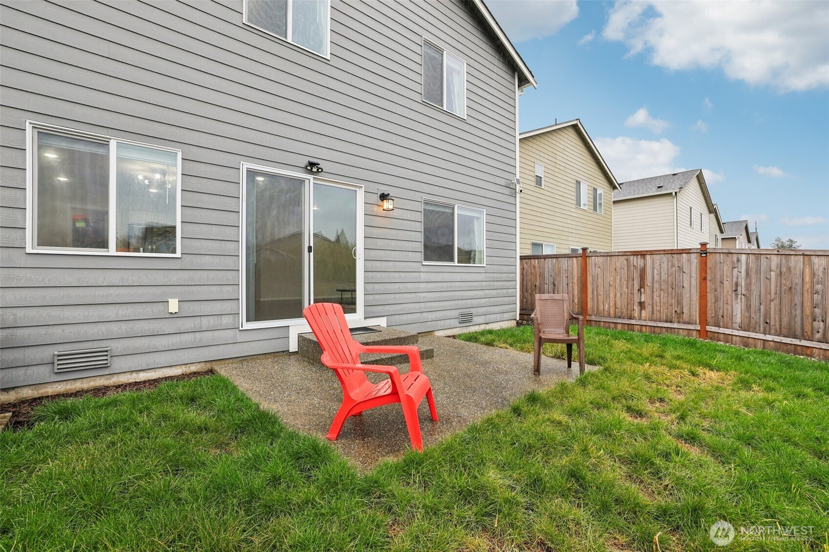 1132 15th Avenue Sultan, WA 98294 - Photo 25 of 25 a view of backyard with a chair and table