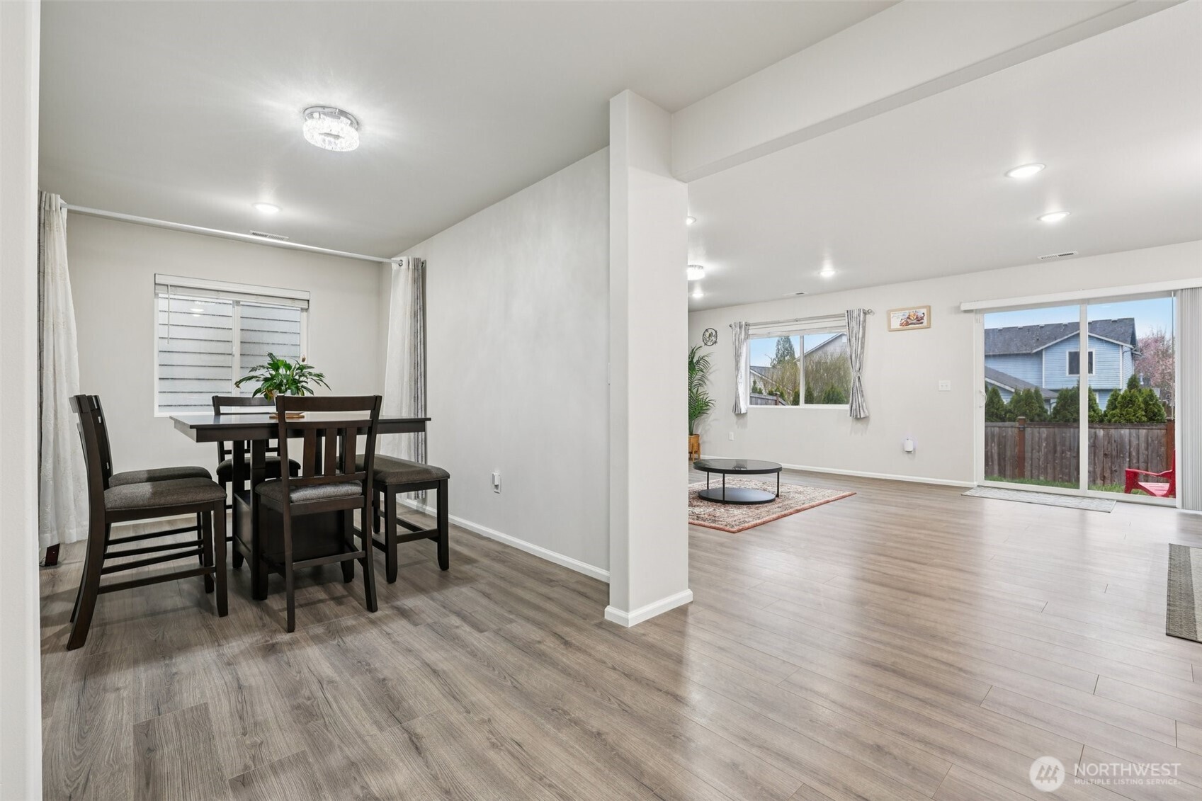 1132 15th Avenue Sultan, WA 98294 - Photo 7 of 26 a view of a dining room with furniture and wooden floor