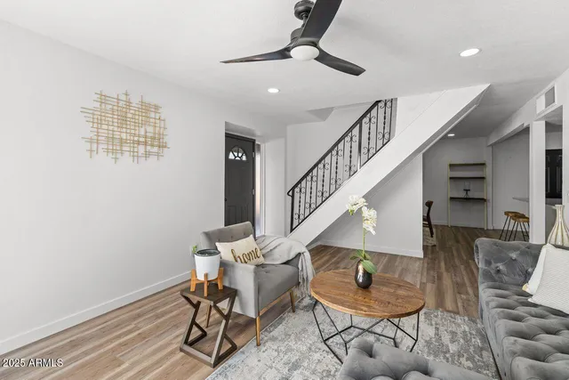 a kitchen with a stove a sink and a microwave