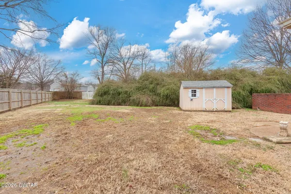 a house view with a garden space