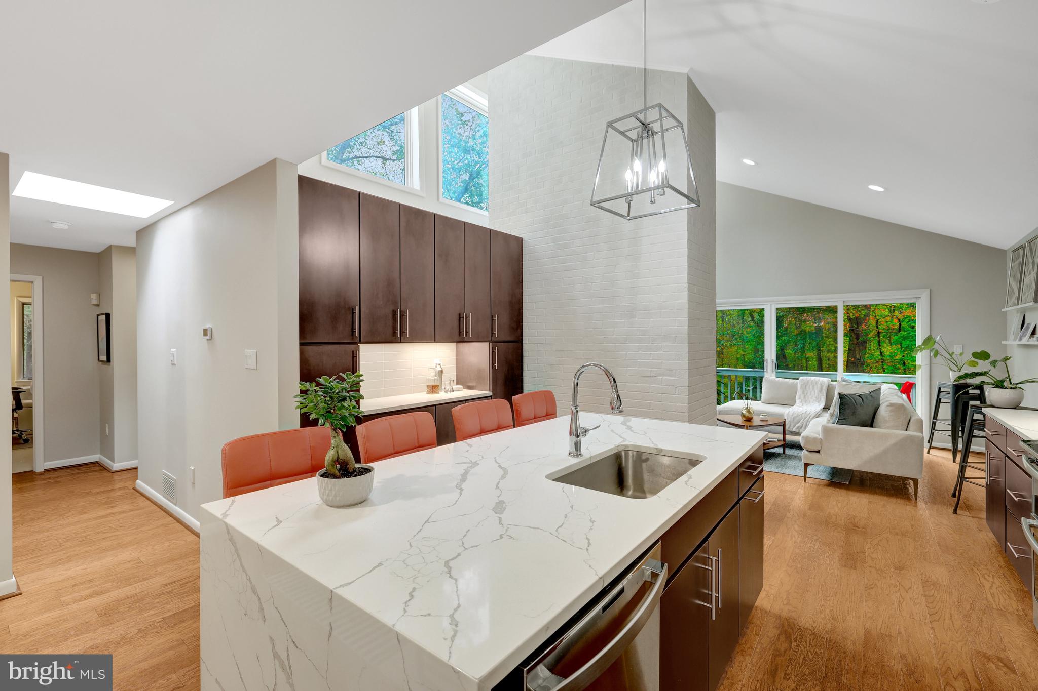 526 Springvale Road Great Falls, VA 22066 - Photo 13 of 55 a kitchen with a table chairs and couches