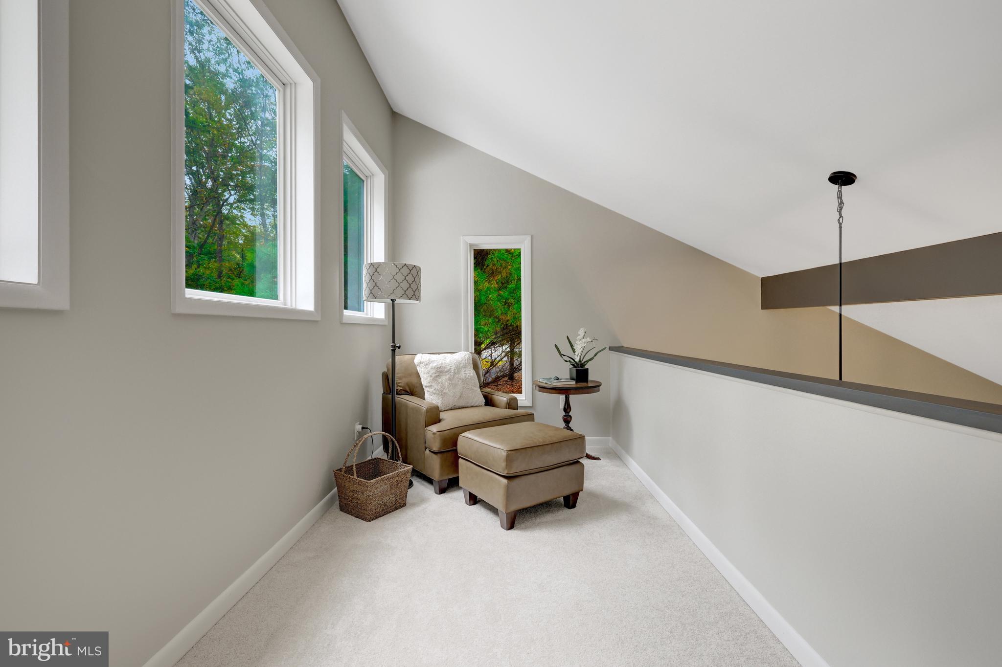 526 Springvale Road Great Falls, VA 22066 - Photo 22 of 55 a living room with furniture and a large window